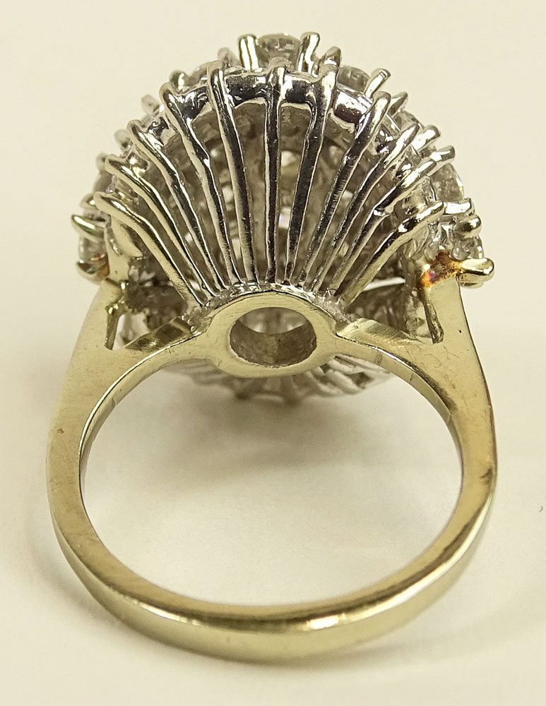 Lady's Vintage Approx. 3.50 Carat Round Brilliant Cut and Baguette Cut Diamond and 14 Karat White Gold Dome Ring.