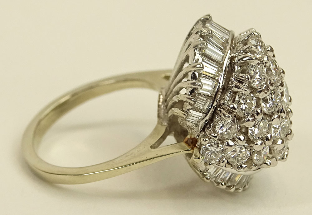 Lady's Vintage Approx. 3.50 Carat Round Brilliant Cut and Baguette Cut Diamond and 14 Karat White Gold Dome Ring.