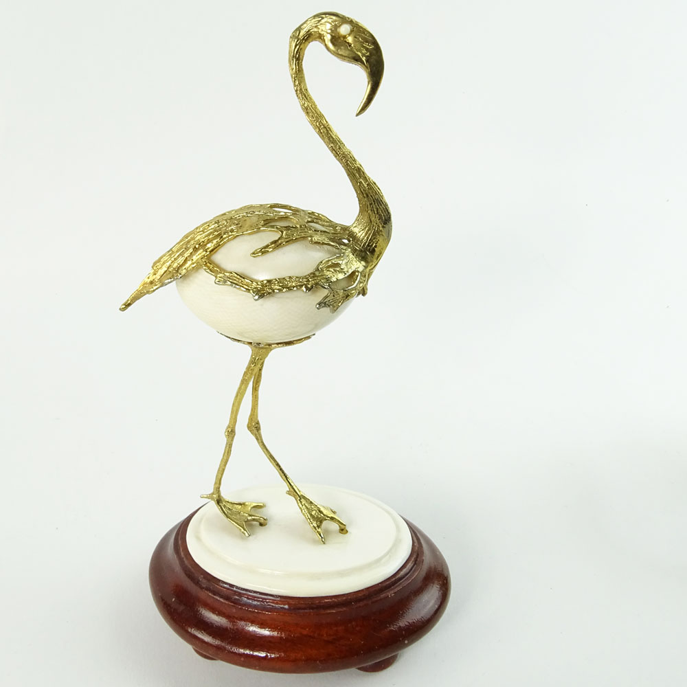 Boxed set of Ivory and 18K Gilt Metal Exotic Bird Figurines. Each bird hand carved and mounted in 18K gold plated metal.