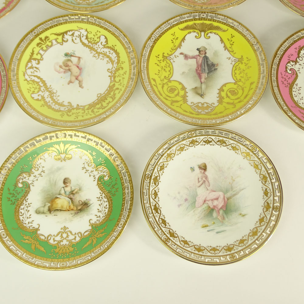 Set of Ten (10) Minton Hand Painted and Parcel Gilt Porcelain Cabinet Plates. Reticulated borders.