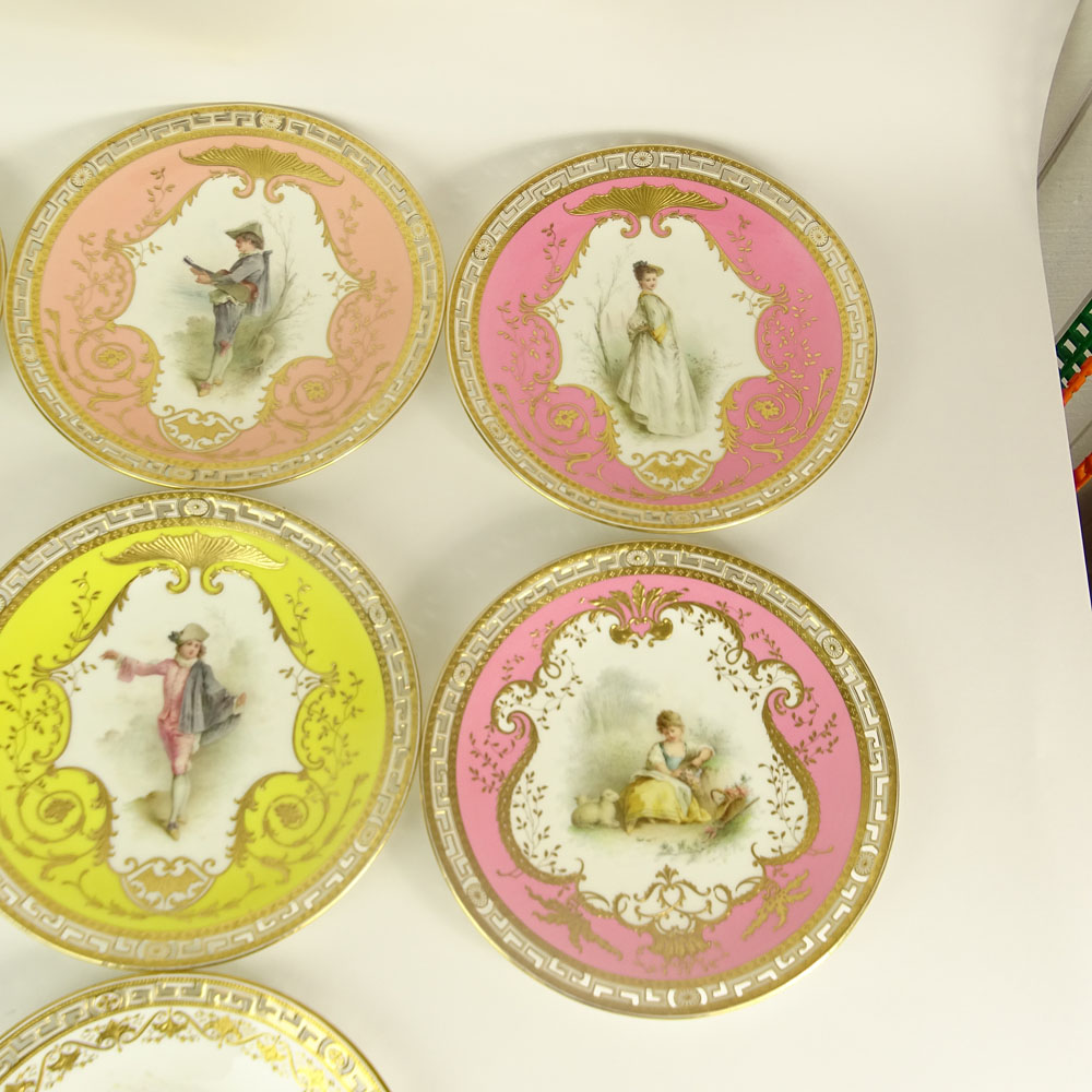 Set of Ten (10) Minton Hand Painted and Parcel Gilt Porcelain Cabinet Plates. Reticulated borders.