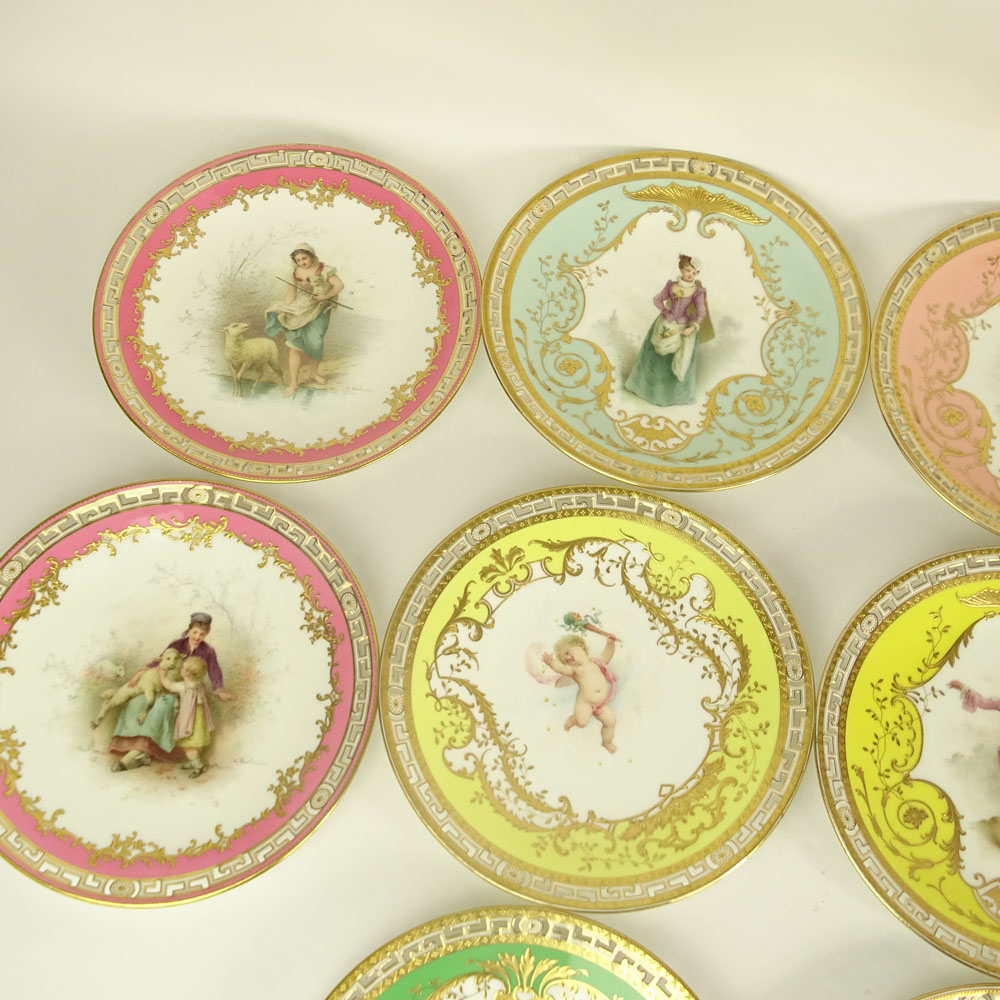 Set of Ten (10) Minton Hand Painted and Parcel Gilt Porcelain Cabinet Plates. Reticulated borders.