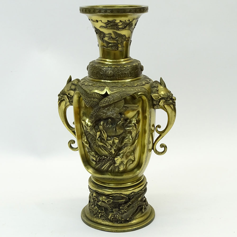 Large Meiji Japanese Bronze Urn. Decorated in high relief of Birds, Chickens, flowers. Foo lion figural handles. 