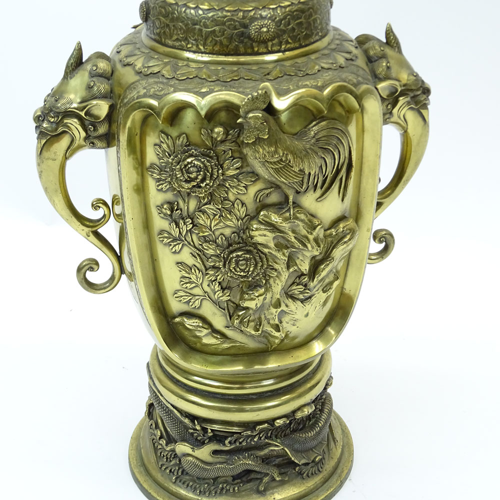 Large Meiji Japanese Bronze Urn. Decorated in high relief of Birds, Chickens, flowers. Foo lion figural handles. 