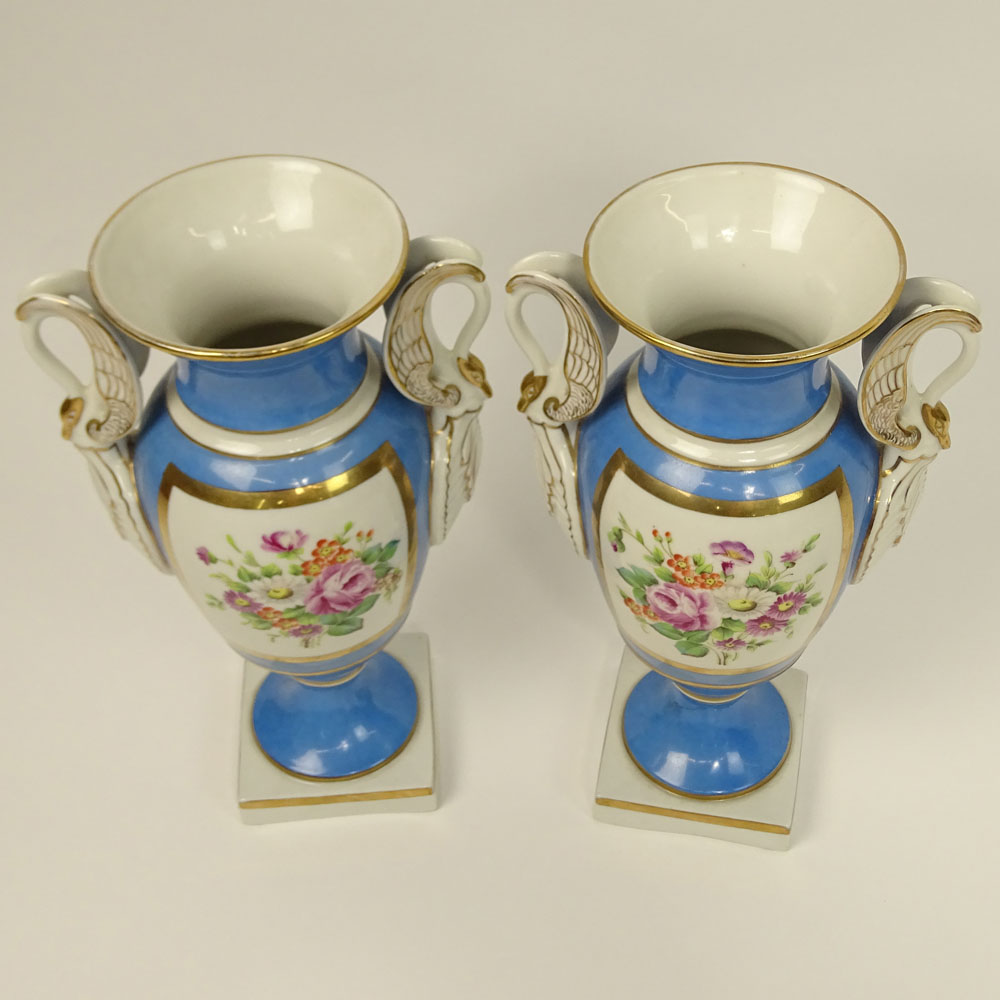 Pair of Antique Sevres Bleu Celeste Hand Painted Porcelain Bolted Urns With Swan Handles.