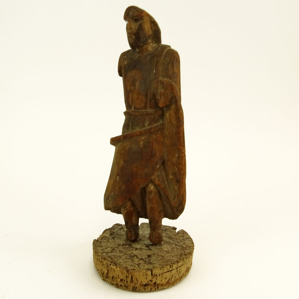 Early Continental Wood Carving of a Man on Cork Base.