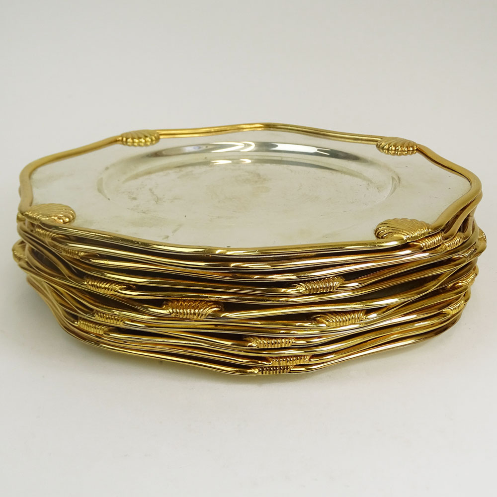 Set of Twelve (12) Alpaca Metal Shell Motif Plates.