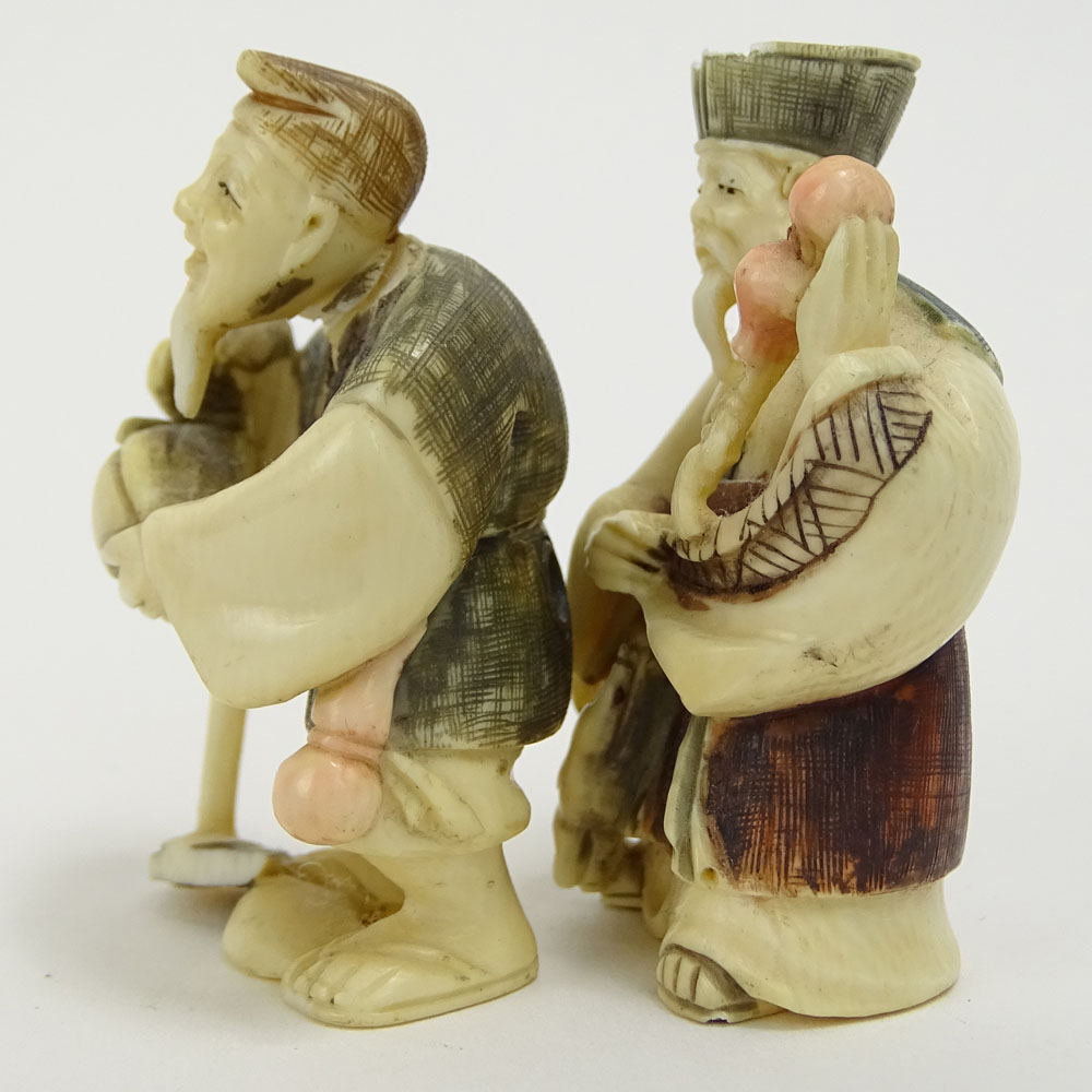 Two Vintage Figural Netsuke. Signed. Small losses. Measures 2". 