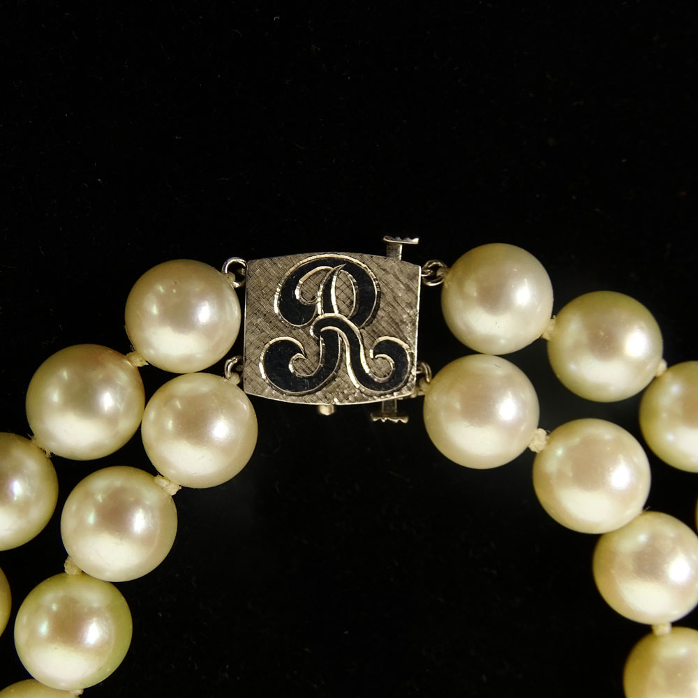 Vintage Double Strand White Pearl Necklace with 14 Karat White Gold Clasp.