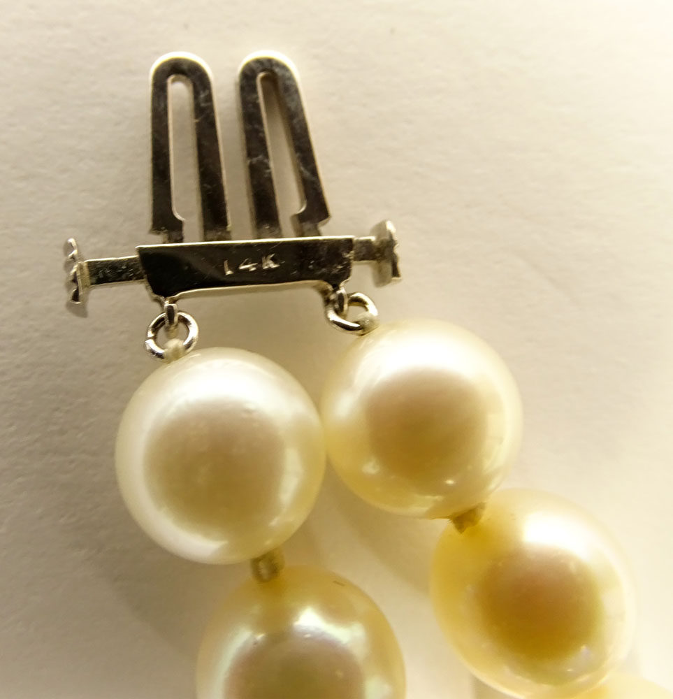 Vintage Double Strand White Pearl Necklace with 14 Karat White Gold Clasp.