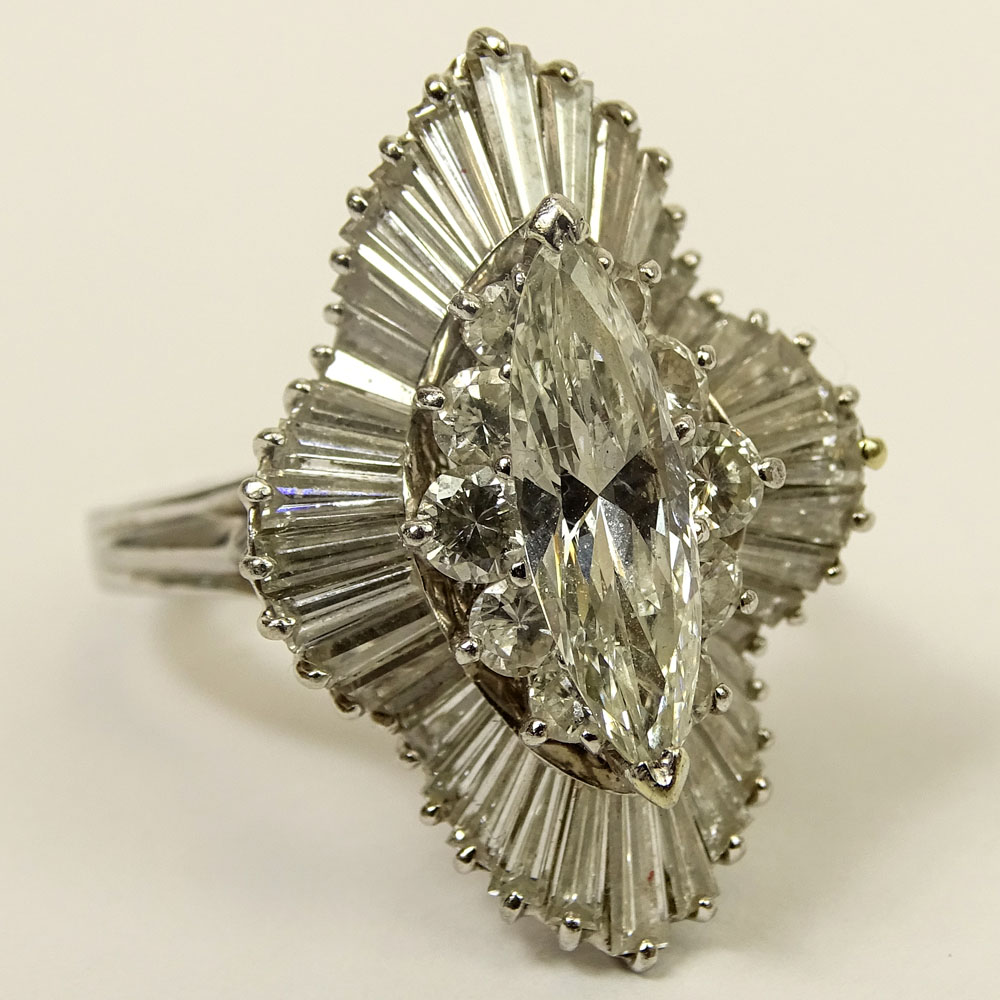 Vintage Approx. 6.0 Carat Total Weight Diamond and Platinum Ballerina Ring Set in the Center with a Marquise Diamond