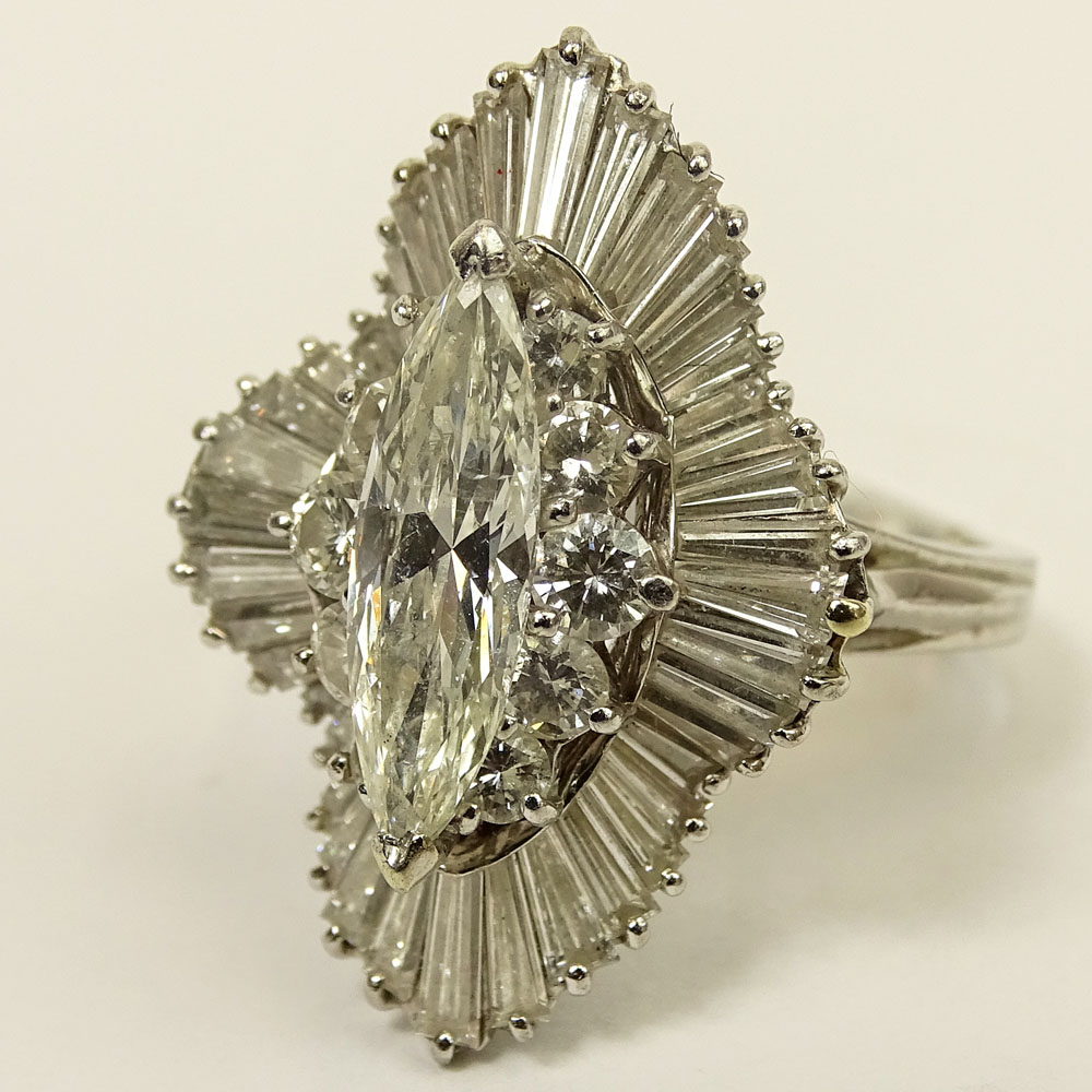 Vintage Approx. 6.0 Carat Total Weight Diamond and Platinum Ballerina Ring Set in the Center with a Marquise Diamond