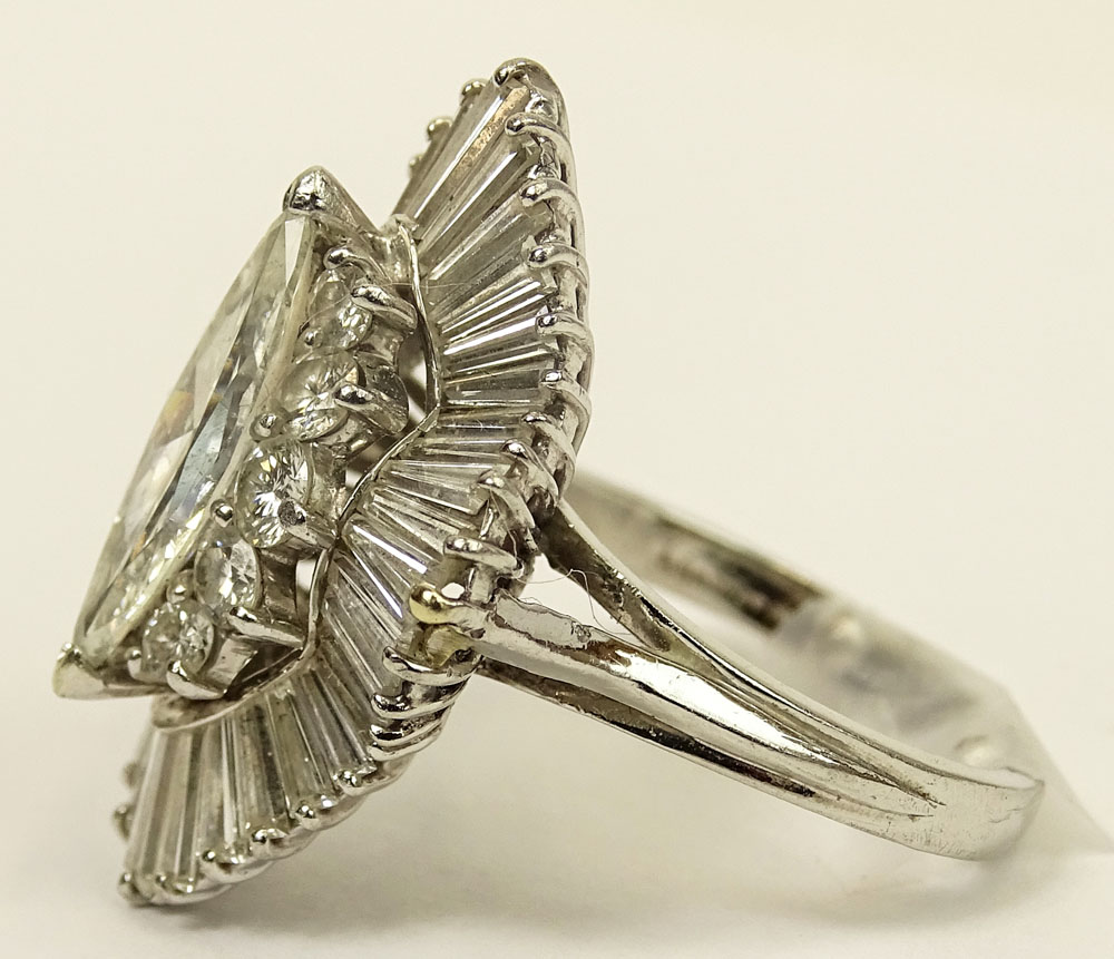 Vintage Approx. 6.0 Carat Total Weight Diamond and Platinum Ballerina Ring Set in the Center with a Marquise Diamond