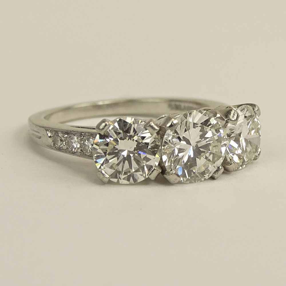 Tiffany & Co Three (3) Stone Diamond and Platinum Ring.