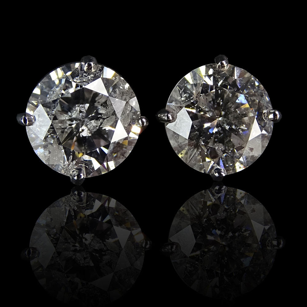 Approx. 5.0 Carat Round Brilliant Cut Diamond and 14 Karat White Gold Ear Studs.