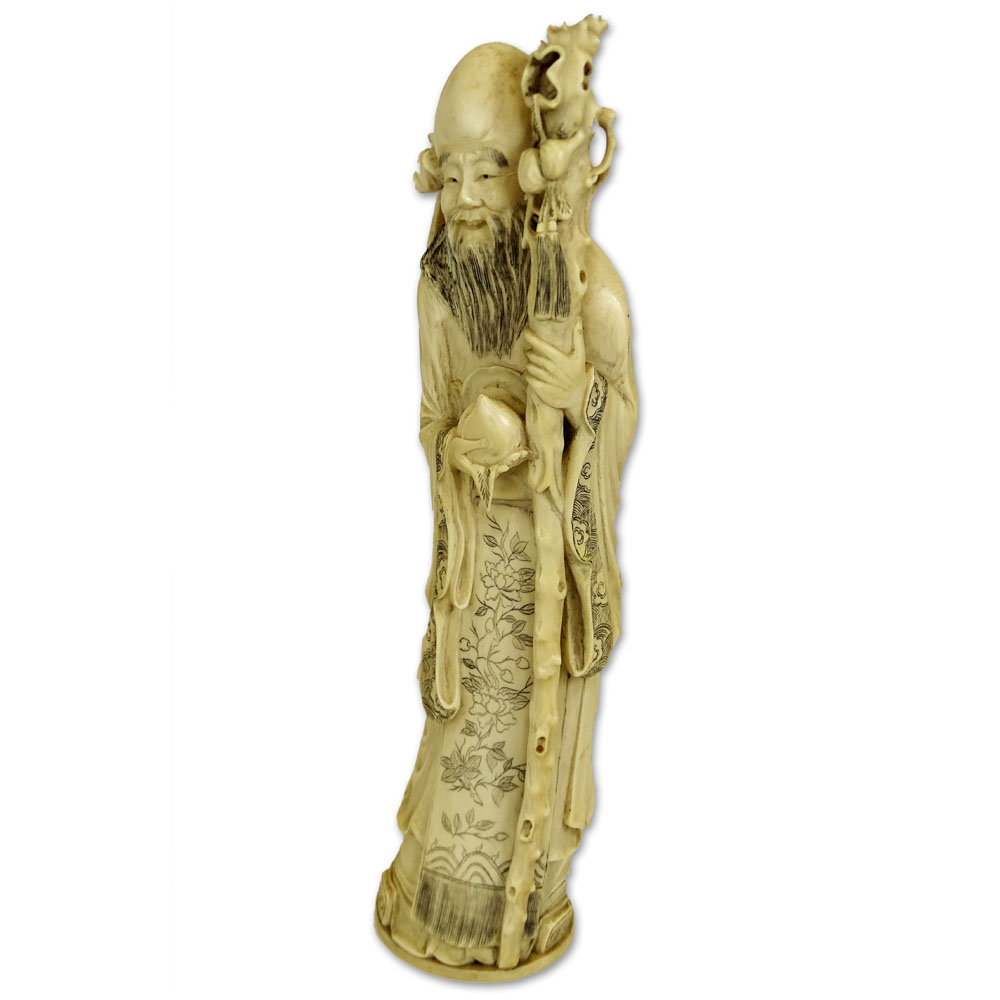 Antique Chinese Carved Ivory Immortal Figure.