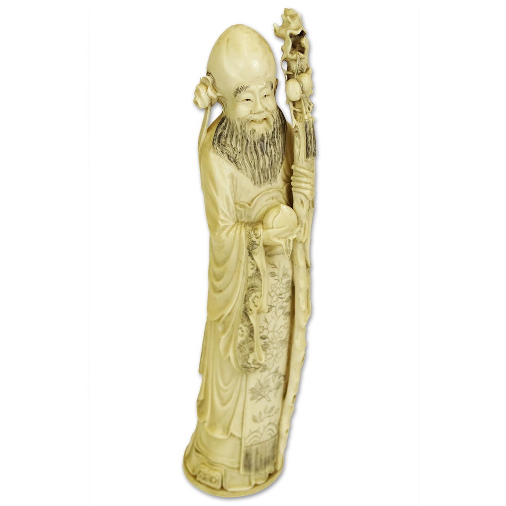 Antique Chinese Carved Ivory Immortal Figure.