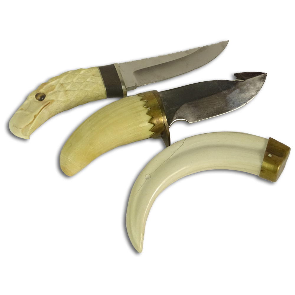 Three piece lot of ivory. Included a carved Ivory handled hunting knife in an eagle motif with tigers eye