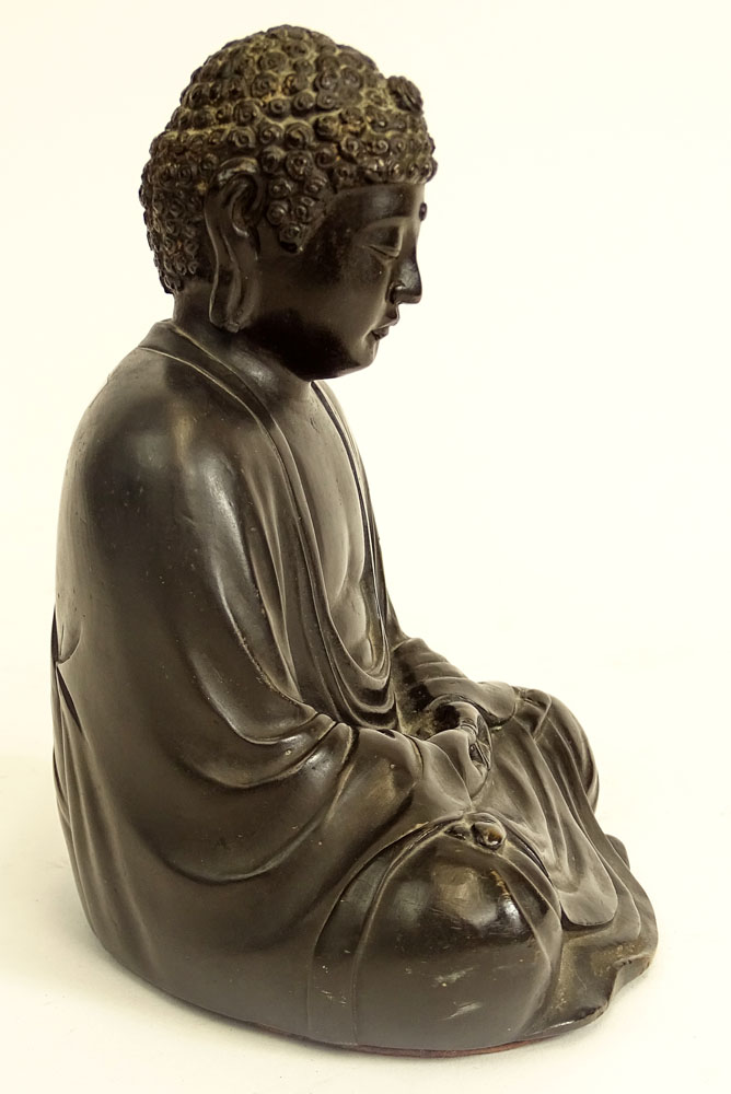 Antique Chinese Bronze Buddha Figure. Dark brown patina.