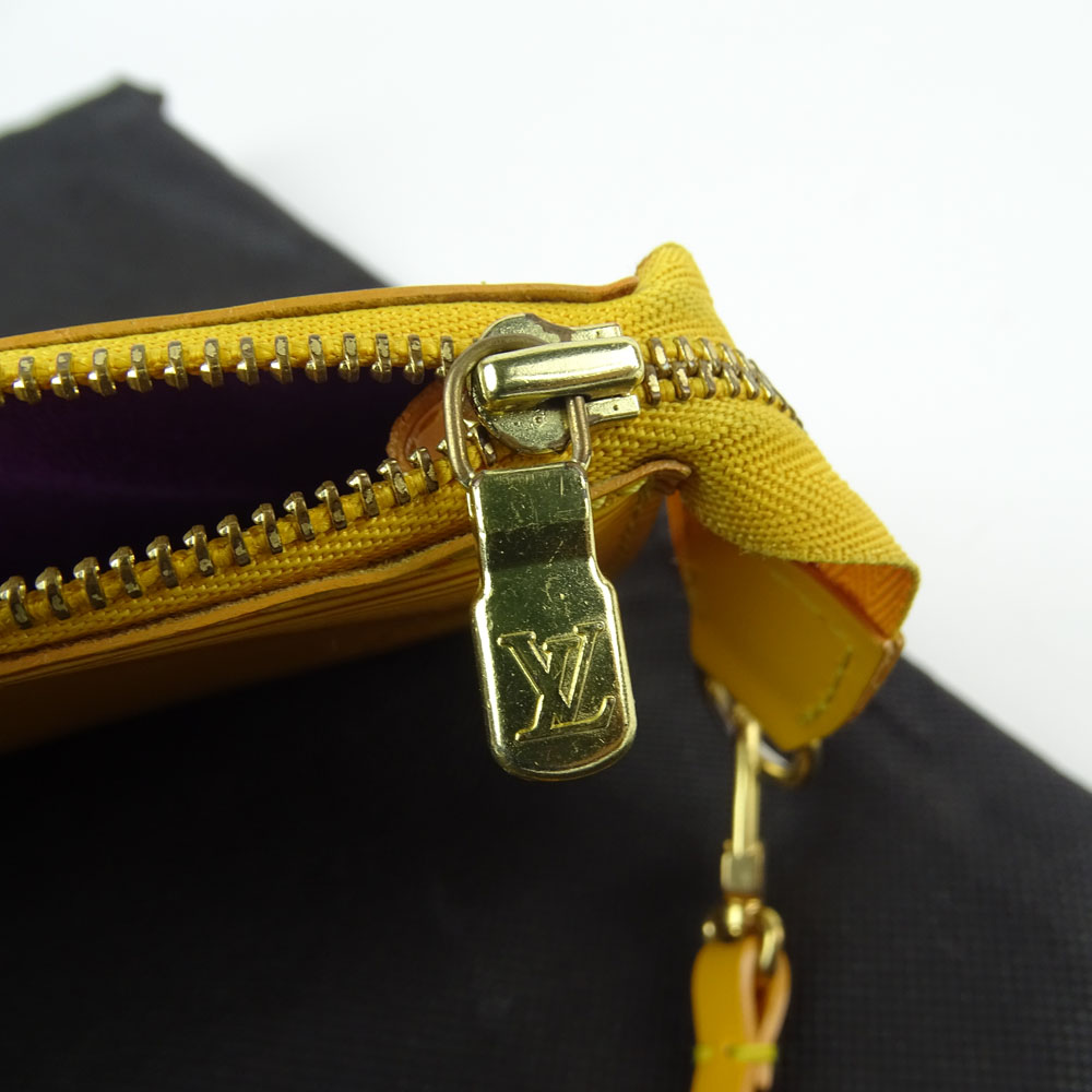 Nice Pre-Owned Louis Vuitton Yellow Leather Wristlet clutch handbag.