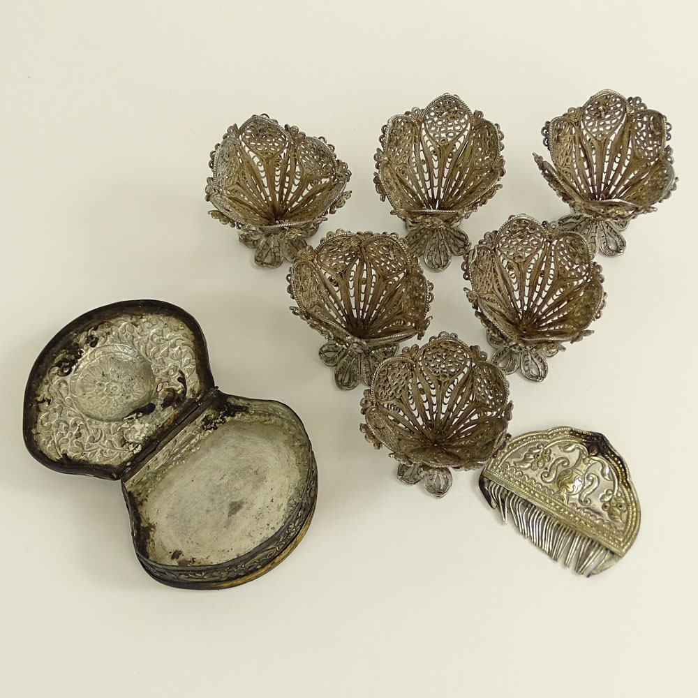 Miscellaneous Lot of 19/20th Century Turkish Silver. Includes 8 filigree cup holders, a small chased box containing a comb.