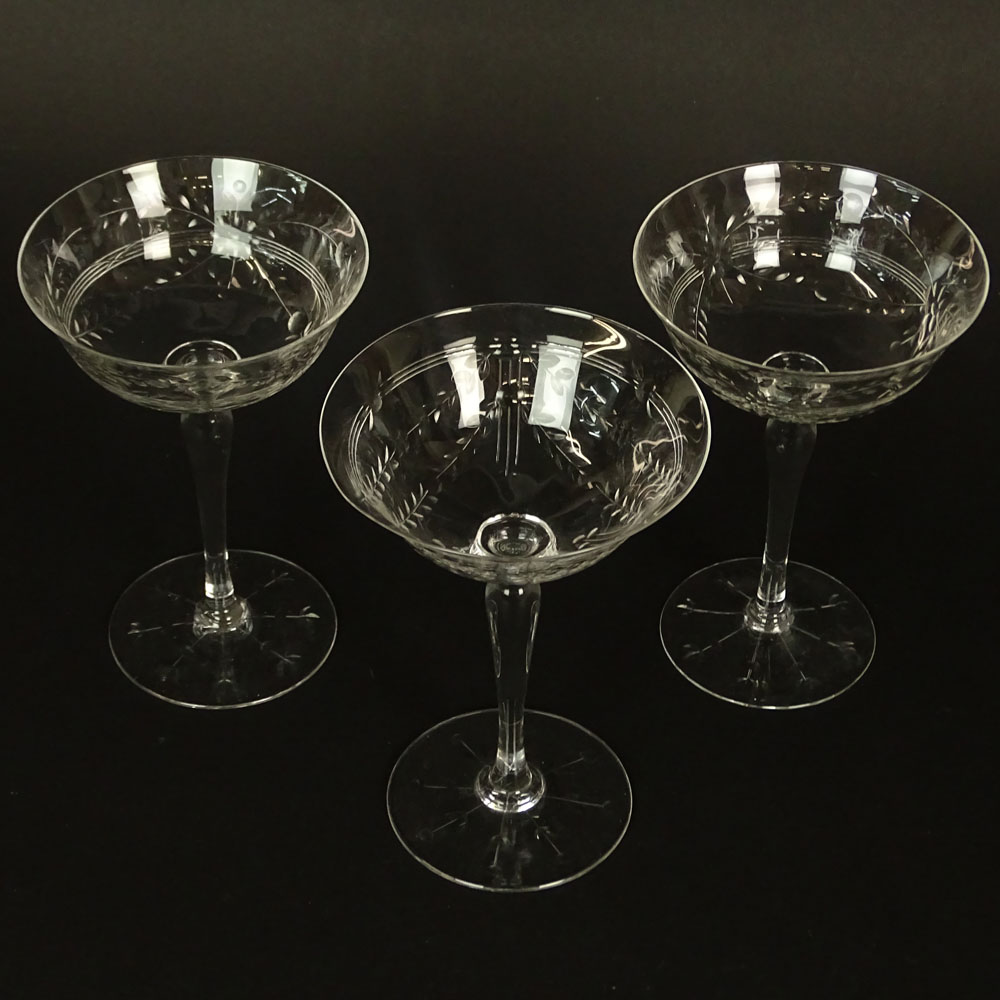 Three Vintage Etched Crystal Champagne Coupes.