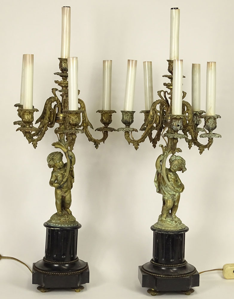 Pair French Louis XVI Style Bronze Putti Candelabra Table Lamps. Each was fashioned in the form of a five-arm candelabra