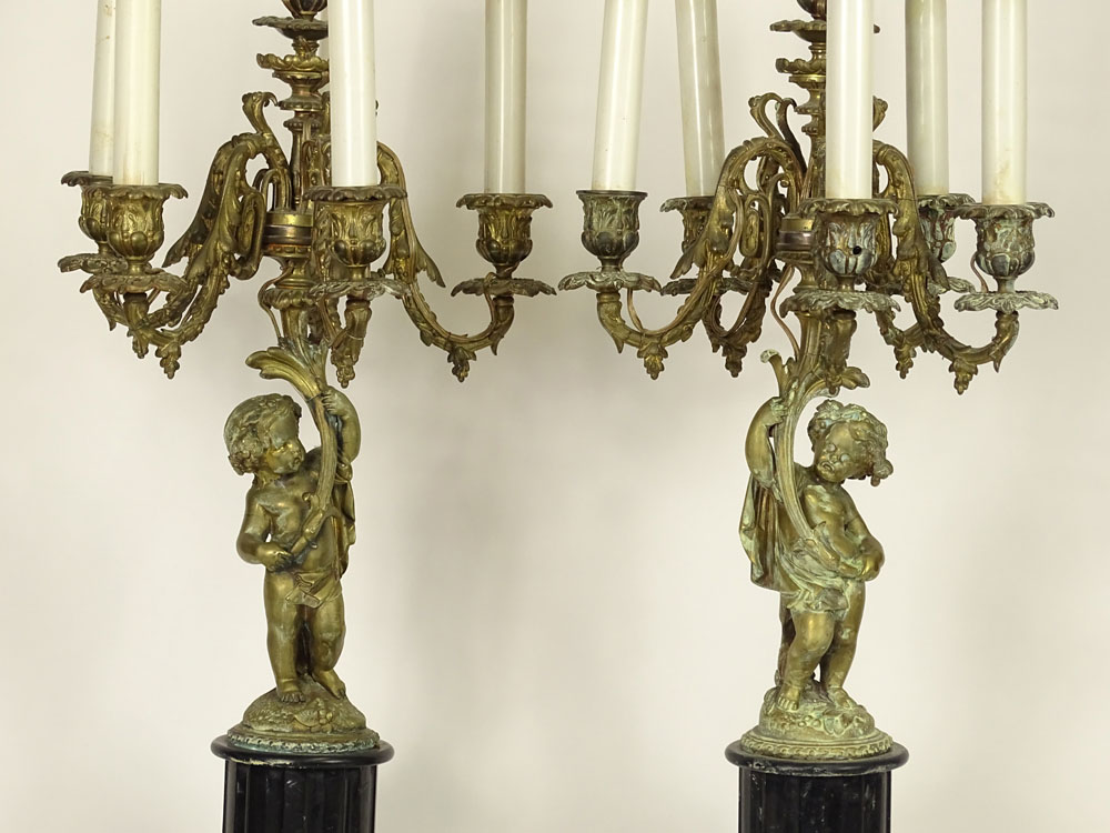 Pair French Louis XVI Style Bronze Putti Candelabra Table Lamps. Each was fashioned in the form of a five-arm candelabra