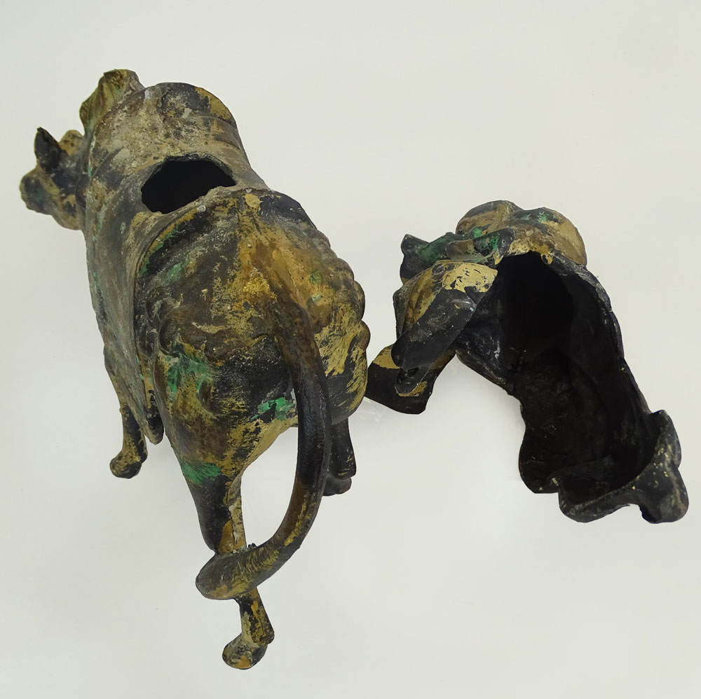 A Chinese Iron Sculpture Depicting a Scholar on a Donkey and a Miniature Ming Tree.