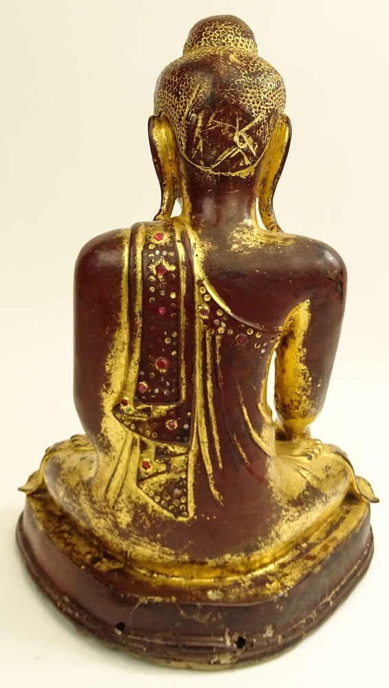 Antique Chinese Bronze of Seated Buddha. Losses to top of head reveal a very old bronze.