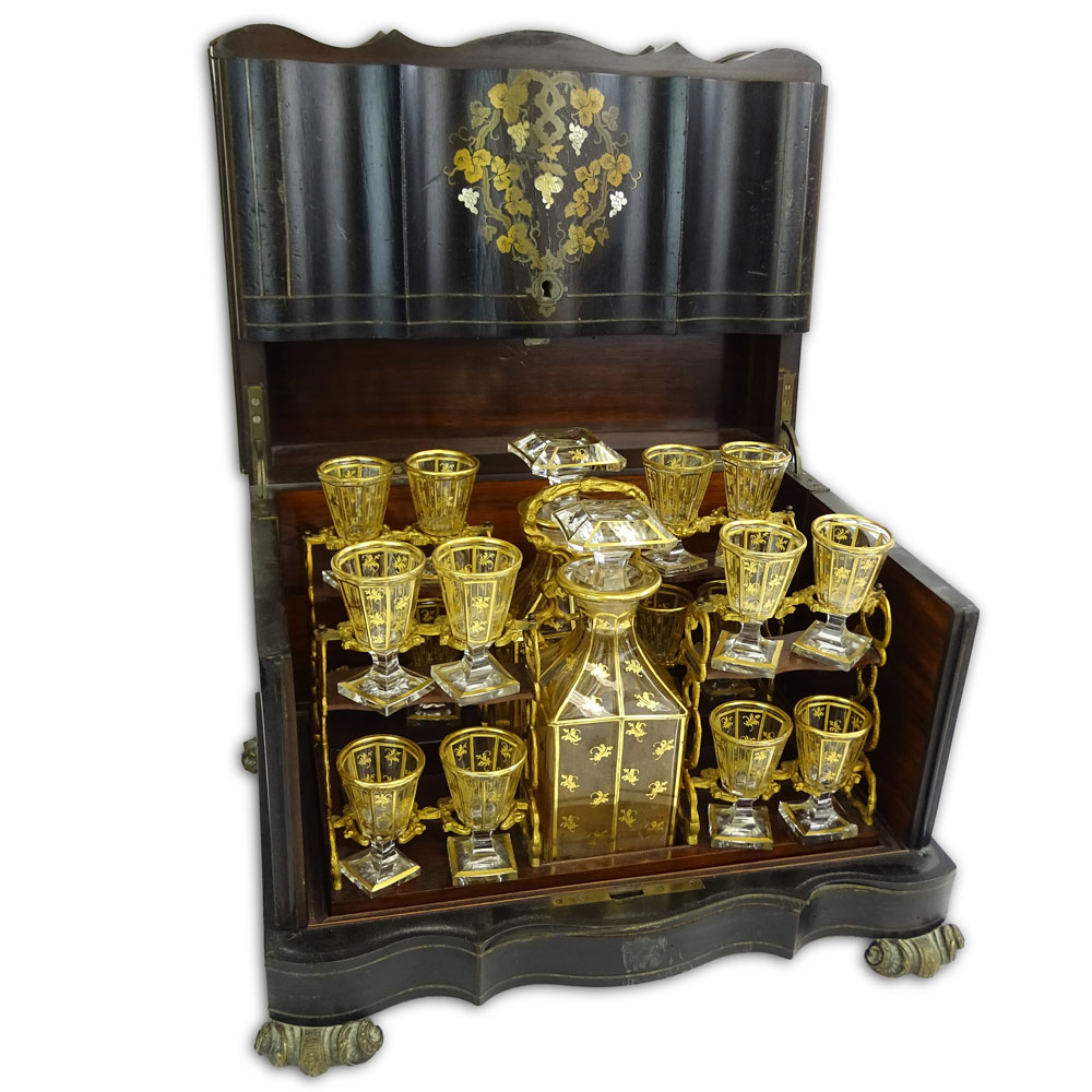 Antique Tantalus Liquor Cabinet. Lacquered wood cabinet with inlaid motif...