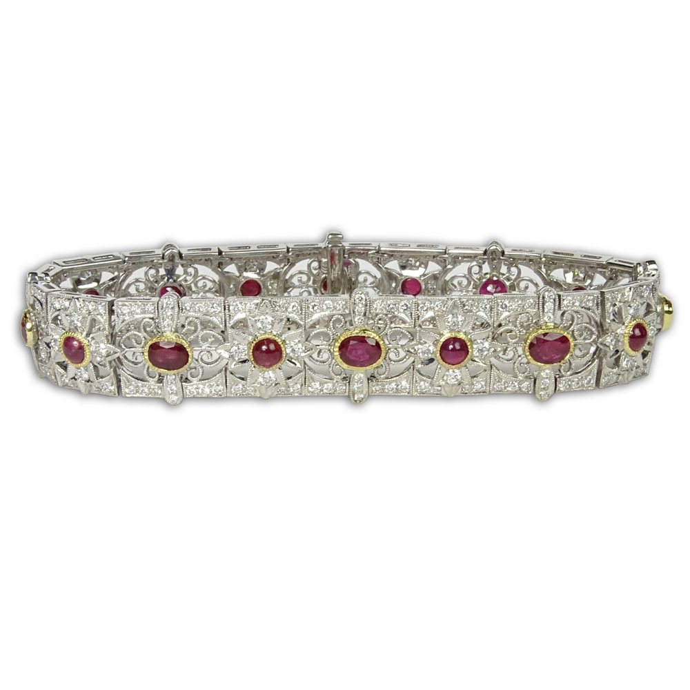 Antique style 18 Karat White Gold Filigree Bracelet Set with Approx. 5.50 Carat Cabochon Rubies and 3.50 Carat Round Brilliant Cut Diamonds.