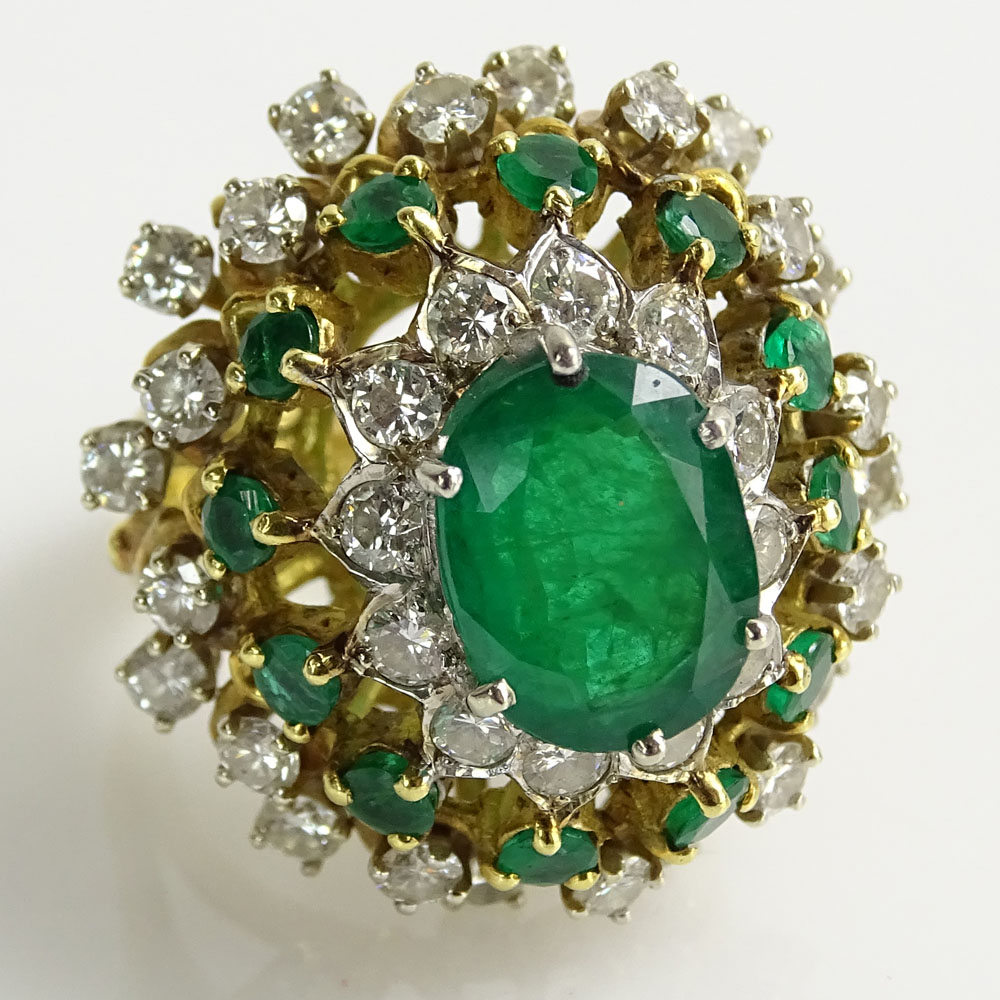 Lady's Vintage Approx. 4.35 Carat Emerald, 2.15 Carat Round Brilliant Cut Diamond and 18 Karat Yellow Gold Ring Set in the center with a 3.50 Carat Oval Cut Emerald.