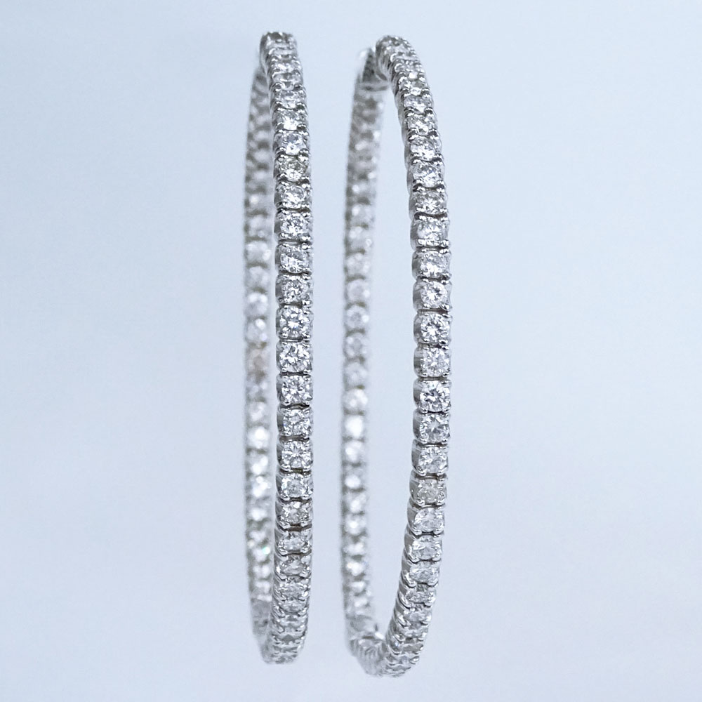 Approx. 5.0 Carat Round Brilliant Cut Diamond and 14 Karat White Gold In and Out Hoop Earrings.