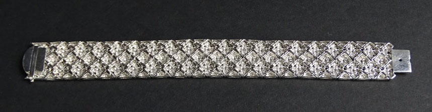 Van Cleef & Arpels style Approx. 13.0 Carat Round Brilliant Cut Diamond and 18 Karat White Gold Bracelet.