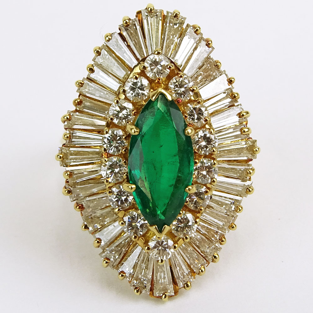 Lady's Approx. 3.75 Carat Colombian Muzo Mine Marquise Cut Emerald, 1.75 Carat Round and Baguette Cut Diamond and 18 Karat Yellow Gold Ballerina Ring. 