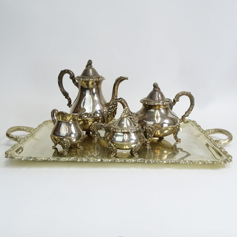 Four (4) Piece Sterling Silver Tea Set on Silver Plate Tray. Includes coffee pot, tea pot, creamer and sugar bowl. 