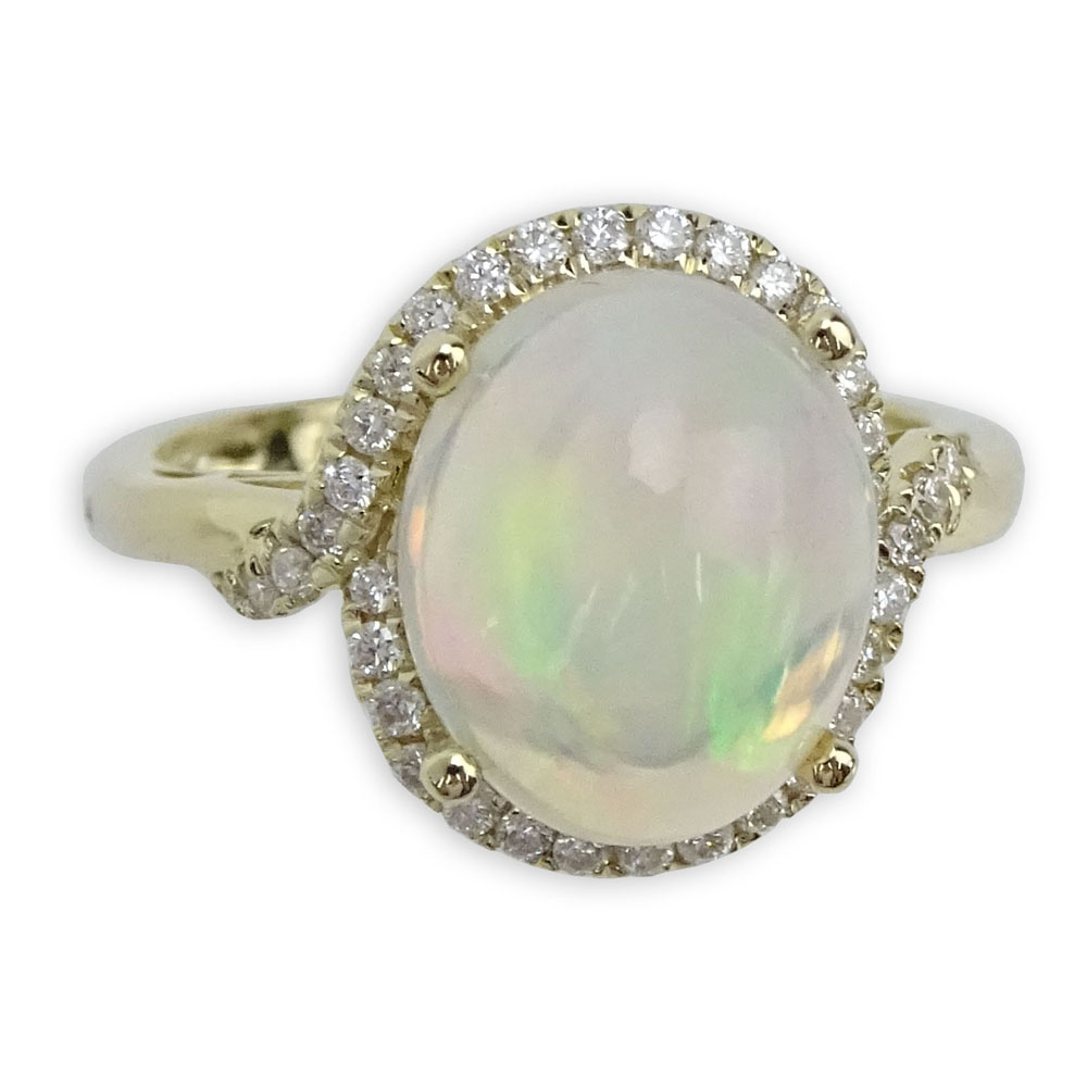 Approx. 3.09 Carat White Opal, Diamond and 14 Karat Yellow Gold Ring