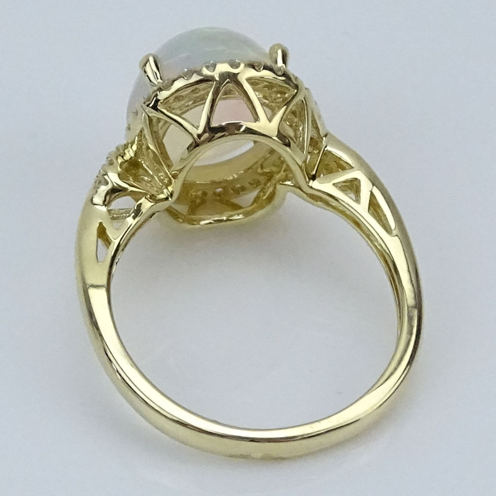 Approx. 3.09 Carat White Opal, Diamond and 14 Karat Yellow Gold Ring