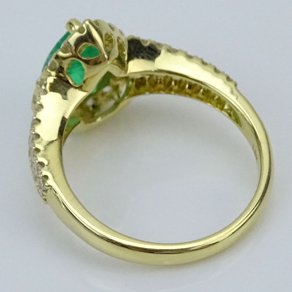 1.37 Carat Pear Shape Emerald, .80 Carat Round Brilliant Cut Diamond and 18 Karat Yellow Gold Ring