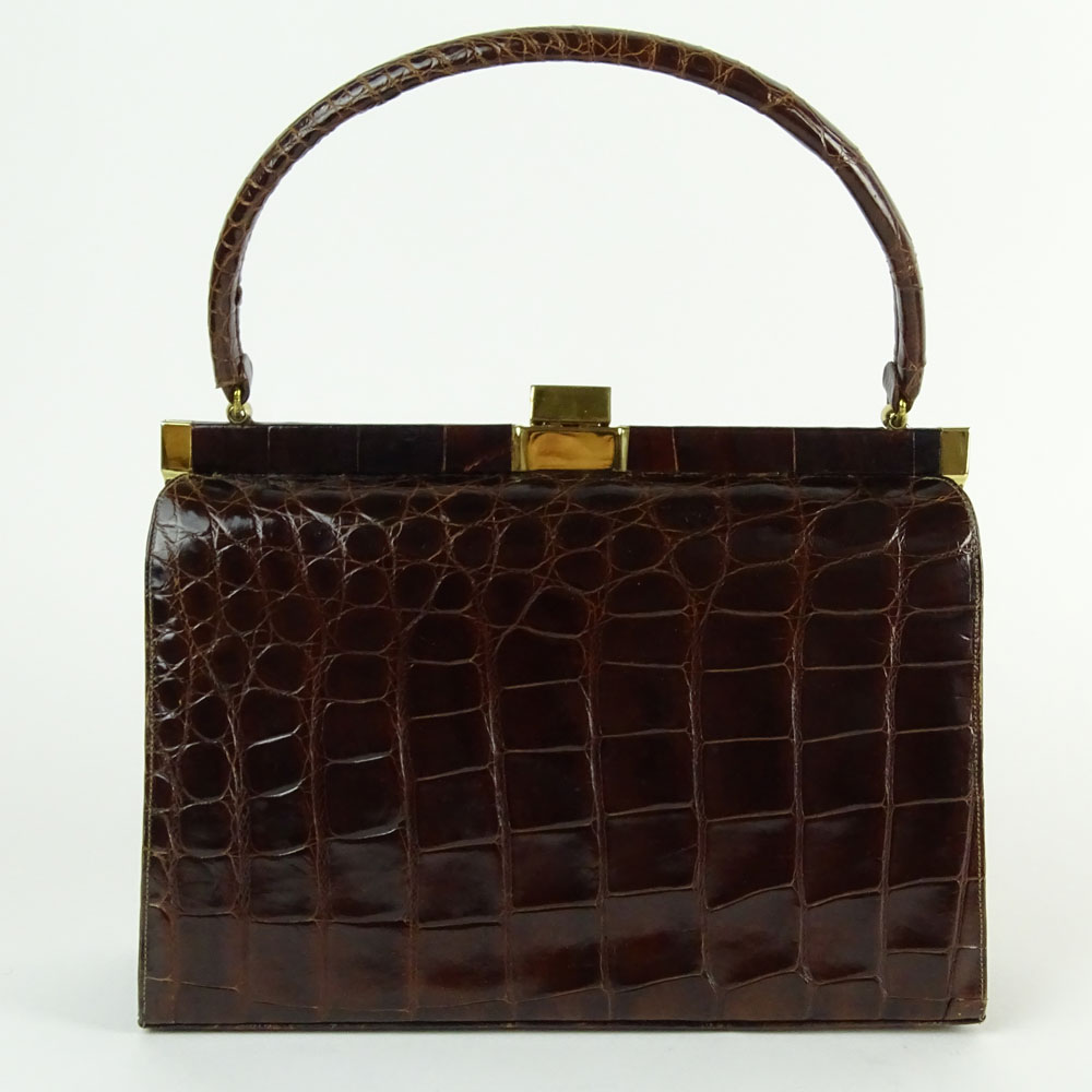 Vintage Alligator Handbag. Rich brown color with gold tone hardware