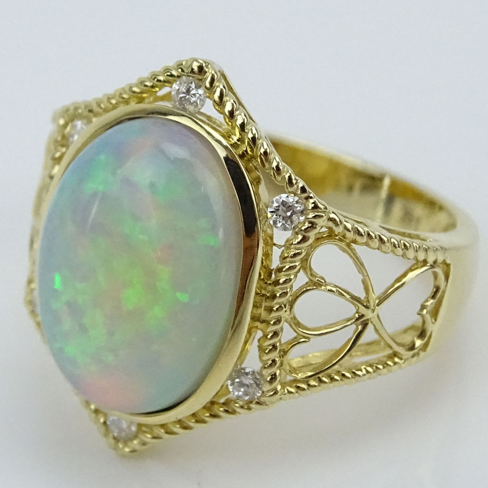 Approx. 4.03 Carat White Opal, Diamond and 14 Karat Yellow Gold Ring