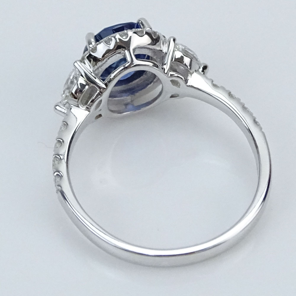 1.99 Carat Oval Cut Sapphire, .64 Carat Diamond and 18 Karat White Gold Ring