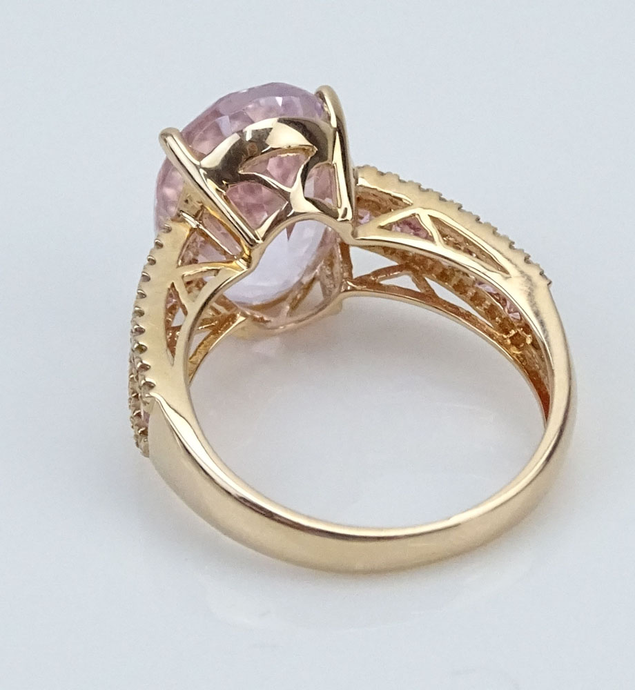 7.17 Carat Oval Cushion Cut Kunzite, .65 Carat Pink Sapphire, .18 Carat Round Cut Diamond and 14 Karat Rose Gold Ring