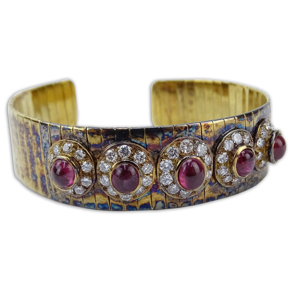 Vintage Cabochon Ruby, Approx. 2.5 Carat Round Brilliant Cut Diamond and 18 Karat Yellow Gold Flexible Cuff Bangle. 