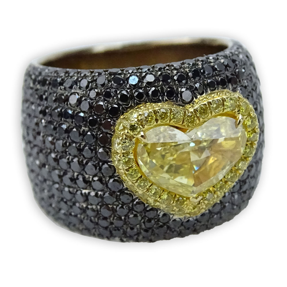 GIA Certified 1.19 Carat Heart Shape Fancy Intense Yellow Diamond and 18 Karat Yellow Gold Ring