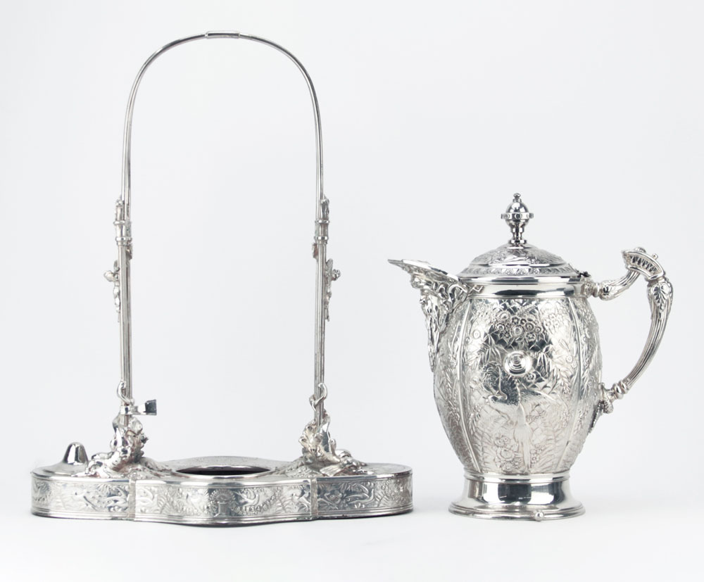 Ornate Victorian Roger Bros. Silver Plate Water Tippler. Figural spout, birds, flowers, dolphins throughout.