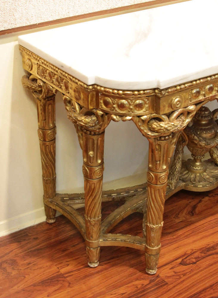 Fine Quality Large Early to Mid 19th Century Louis XVI style Carved and Gilt Wood Console with Heavy Marble Top.