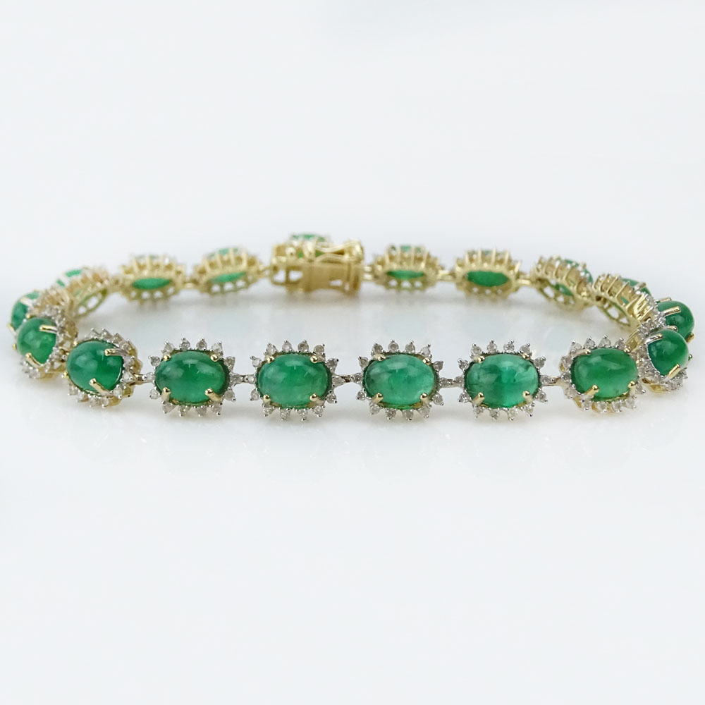 AIG Certified 16.93 Carat Oval Cabochon Cut Emerald, 1.35 Carat Round Brilliant Cut Diamond and 14 Karat Yellow Gold Bracelet. 