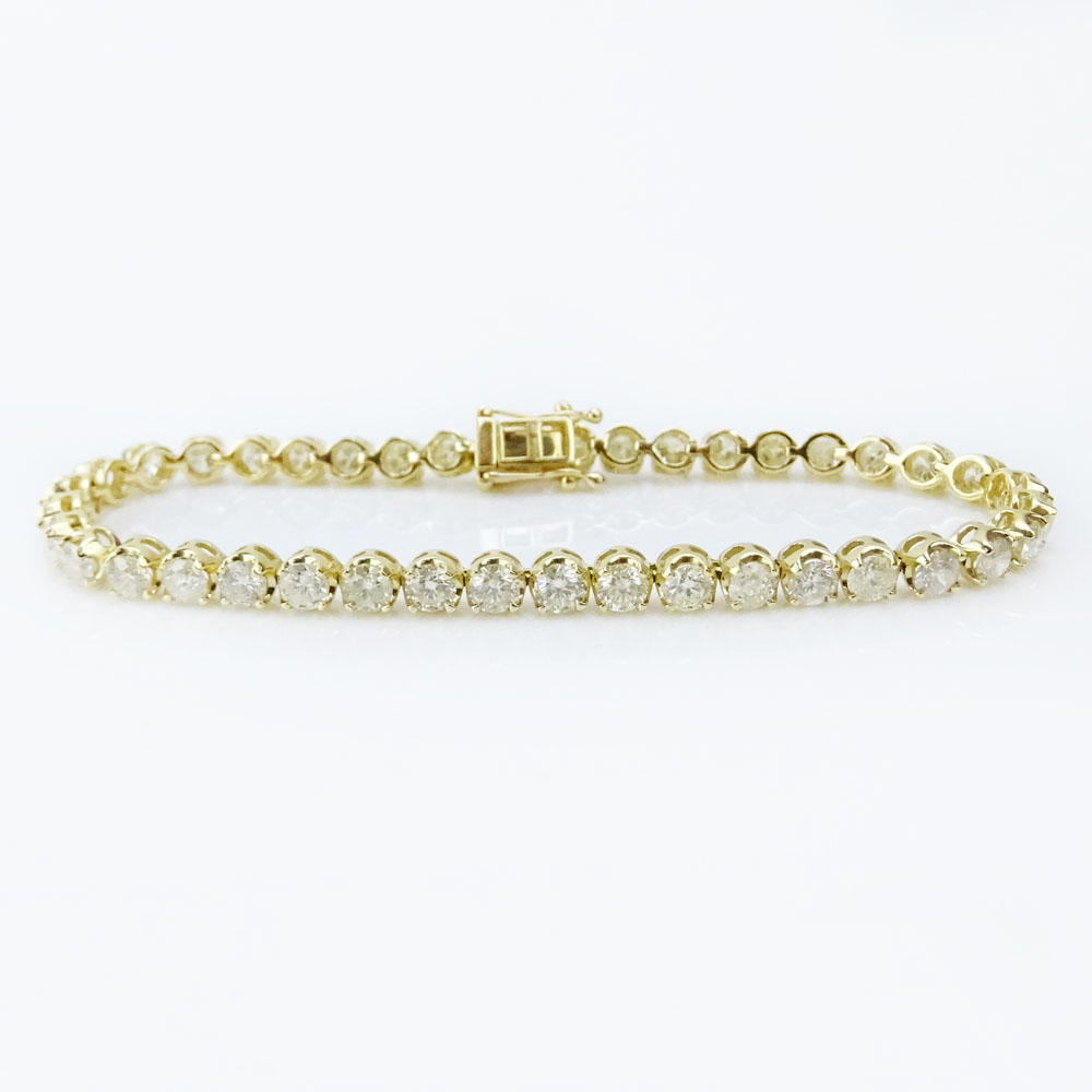 AIG Certified 8.52 Carat Round Brilliant Cut Diamond and 18 Karat Yellow Gold Tennis Bracelet.